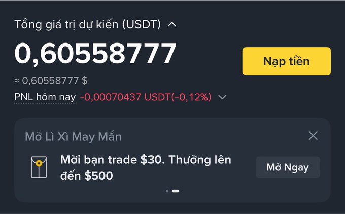 A cryptocurrency exchange interface in Vietnamese showing total estimated value of 0.60558777 USDT with a profit/loss of -0.00070437 USDT (-0.12%) and a 'Nạp tiền' (deposit) button.