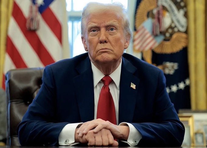Donald Trump sits in the Oval Office, implying his administration's potential involvement in the reported US strike on an agricultural water pumping station in Mahshahr, Iran.