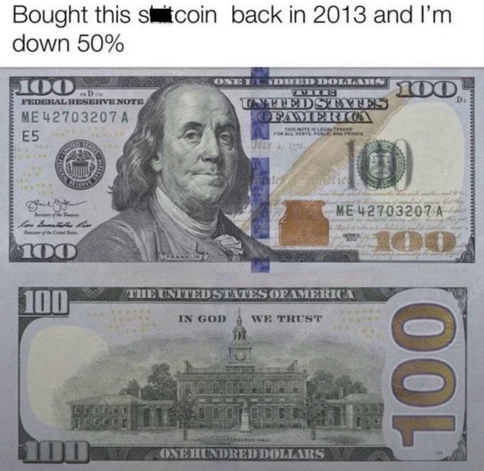 A meme showing a $100 bill with text 'Bought this s**tcoin back in 2013 and I'm down 50%', humorously depicting cryptocurrency losses.