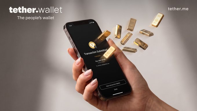 An advertisement for 'tether.wallet - The people's wallet,' showing a hand holding a smartphone displaying a transaction confirmation screen while gold bars float around the device.