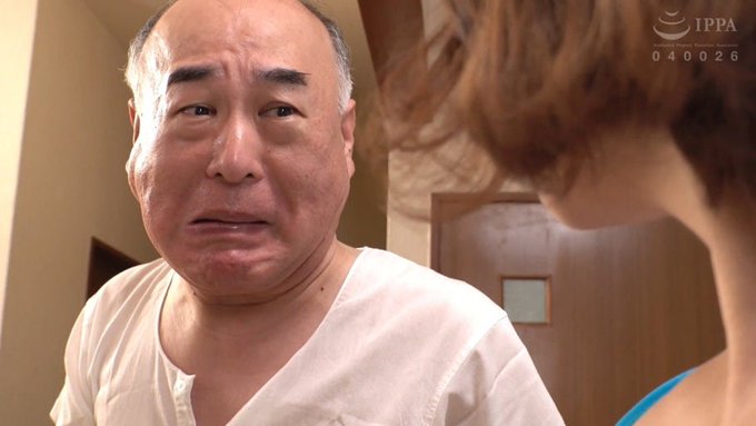 A close-up shot shows a man with a tearful, emotional expression on his face looking toward another person whose back is to the camera, with the 'IPPA' logo and number '040026' visible in the upper right corner.