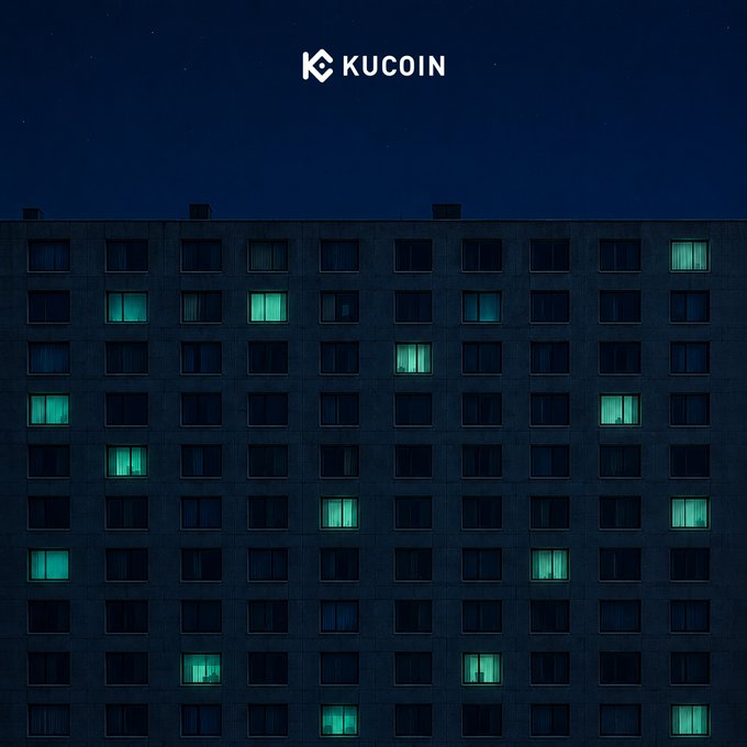 The KuCoin logo appears at the top of an image showing a dark apartment building at night, with scattered windows illuminated in green—symbolizing how KuCoin's trading bots stay active and watch the market 24/7 even while users sleep.