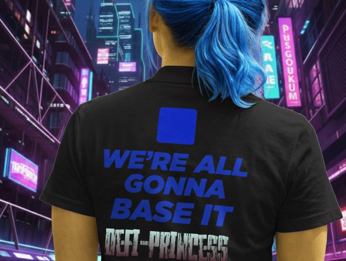 The image features a person wearing a black t-shirt with blue text that says "We're all gonna base it". The person has blue hair, which adds a unique touch to their appearance. The background of the image shows a cityscape at night, with neon lights illuminating the scene and buildings in the distance.
