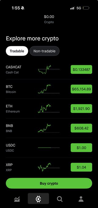 A mobile app screenshot showing a crypto trading platform with $0.00 balance and a list of tradable cryptocurrencies including CASHCAT ($0.133487), BTC ($65,154.89), ETH ($1,921.90), BNB ($608.42), USDC ($1.00), and XRP ($1.04), with a green 'Buy crypto' button at the bottom.