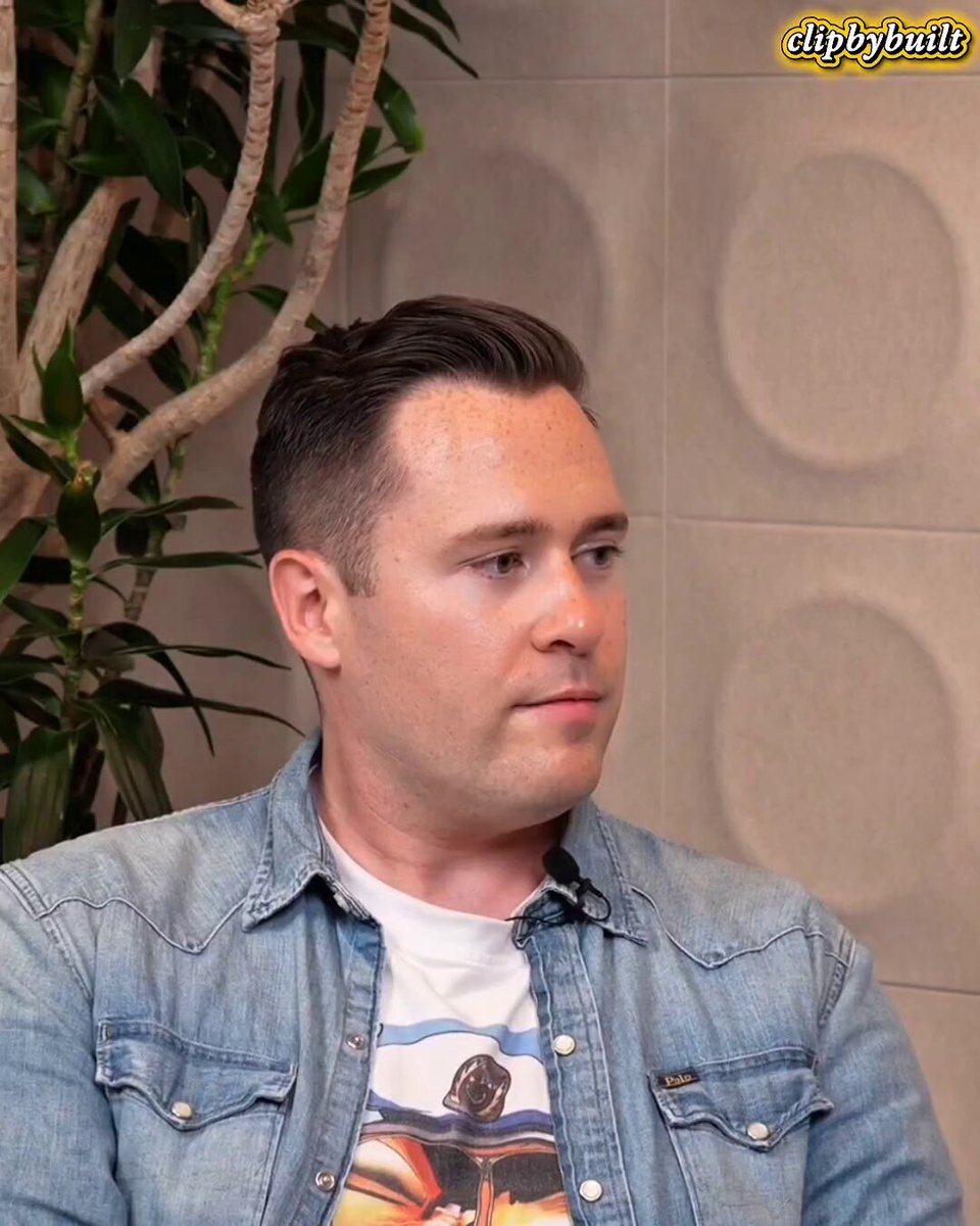 The image features a man wearing a denim jacket, sitting next to a potted plant with green leaves. The man appears to be looking off into the distance or deep in thought. The background of the image includes a wall adorned with circles, which could potentially be an advertisement for Bitcoin or another cryptocurrency. The post also mentions that the man sold his bitcoin to buy ethereum and questions whether he would ever consider selling his bitcoin stack to invest in Ethereum.