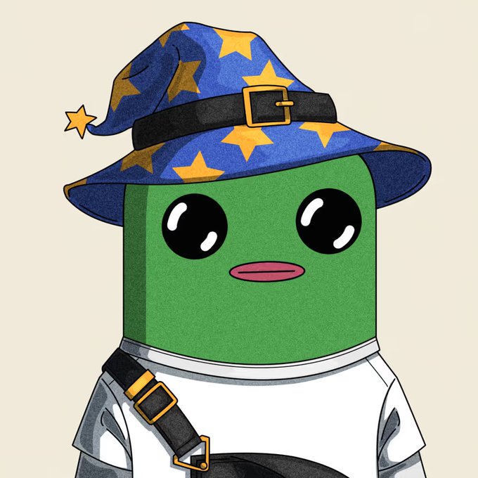 A cartoon-style green character with big black eyes wears a blue wizard hat decorated with yellow stars and a white shirt with a black strap.