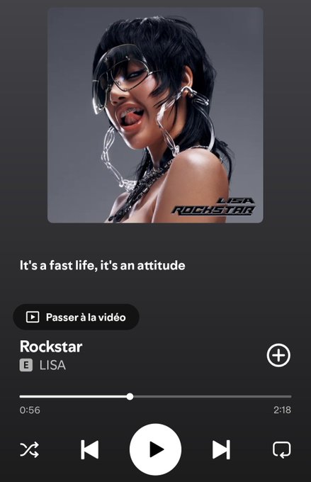 The image shows a Spotify playback screen for the song "Rockstar" by LISA, with the tagline "It's a fast life, it's an attitude." This connects to the post where the user, signing off as "Fastlife," humorously laments being "washed" and liquidated—playing on the song's "rockstar/fast life" theme to introduce themselves as a self-proclaimed down-on-their-luck trader seeking any kind of support.
