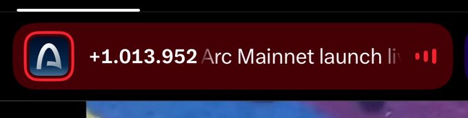 A mobile app header showing an alert from Arc regarding "+1.013.952 Arc Mainnet launch li..." with a pause button.