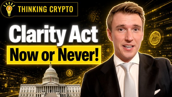 A YouTube thumbnail for "Thinking Crypto" features a smiling young man in a black suit and tie, with the text "Clarity Act - Now or Never!" displayed prominently in white and yellow, alongside an image of the U.S. Capitol building against a dark background filled with cryptocurrency and light bulb graphics.