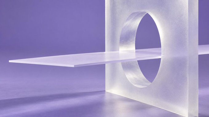 A minimalist 3D rendering shows a silver metallic structure with a circular cutout intersecting a flat white platform against a purple background.