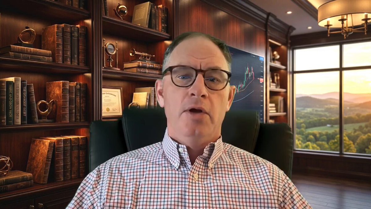 The image shows a man sitting in an office chair, wearing glasses and a plaid shirt. He appears to be giving a presentation or speaking into a camera. The background features a bookshelf filled with numerous books, suggesting that he may work in a library or have a strong interest in reading and knowledge. The post also mentions XRP as a cryptocurrency, which could indicate that the man is discussing financial matters related to wealth management or investing.