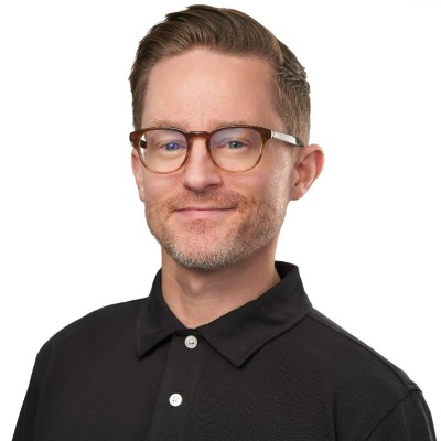 A headshot of a man with glasses and a black polo shirt, likely Craig Beveridge, the newly appointed VP of Talent Acquisition at Ripple who brings five years of experience from Cedar to support the company's next growth phase.