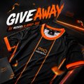 A black and orange polo shirt is displayed with the text "GIVEAWAY" prominently at the top, tied to a social media post about a giveaway event featuring personalities @KT_BTC and Là Thành Phan, who reportedly share the same clothing brand.

Note: The image contains promotional text but no clear numerical values or specific identifiers beyond what's mentioned in the post.