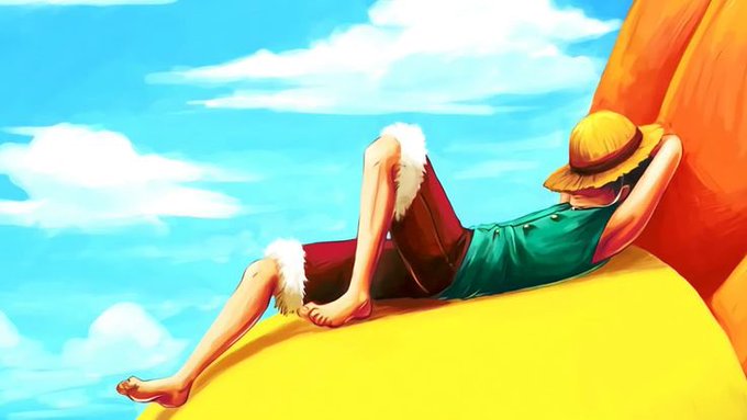 An anime character wearing a straw hat and green shirt relaxing on a yellow surface against a bright blue sky with clouds, resembling Monkey D. Luffy from One Piece.
