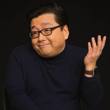 The image features a man wearing glasses, sitting down with his hand raised in the air. The background appears to be black, which contrasts with the man's face and makes him stand out more. The caption of the image reads "BitMine just added 111,942 $ETH last week Now they hold 5.39M ETH Around 4.47% of Ethereum's supply. Soon they will control 5% of ETH!!". This post is related to Bit Mine because it mentions that Bit Mine has just added a significant amount of Ether to their reserves and plans to control 5% of the Ethereum supply in the near future.