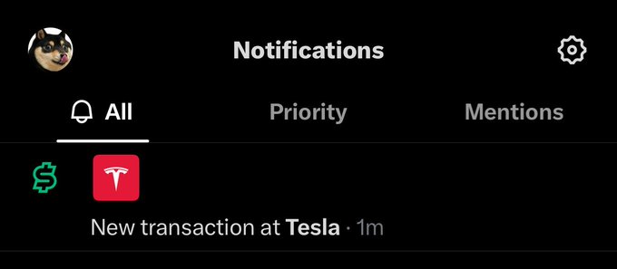 Twitter/X notifications screen showing a new transaction notification at Tesla from 1 minute ago.