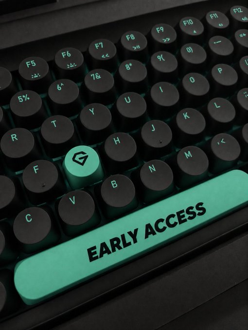 A close-up of a black mechanical keyboard with glowing teal backlighting, featuring a prominent teal 'EARLY ACCESS' spacebar.
