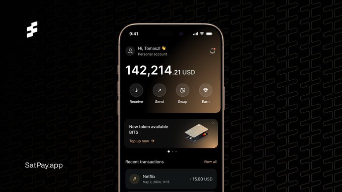 The image shows a smartphone screen displaying an app called "SatPayApp". The app has a dark background, which contrasts with the light-colored phone. On the right side of the screen, there are two buttons labeled "New" and "Sale", possibly indicating features or functions of the app. The main content on the screen is related to Bitcoin transactions, as indicated by the text "Powered by Core A simple interface for plugging into the Bitcoin Power Grid". This suggests that the app might be used for Bitcoin-related activities such as sending or receiving Bitcoins.