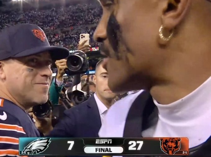 An ESPN sports broadcast showing the final score between the Eagles (7) and Bears (27) during an interview between a coach and a player.