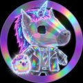 A circular holographic/iridescent sticker or token featuring a cartoon unicorn character with the letter 'A' on its body, set against a black background.