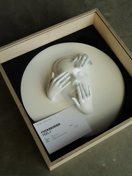 A sculptural piece in a wooden box shows a white circular form with hands covering a face, labeled 'FVCKRENDER FEEL' on a business card.