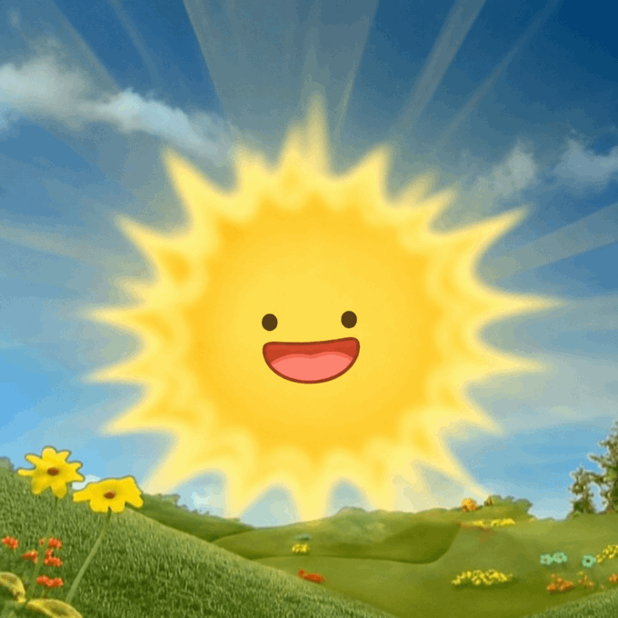 A cute, cartoon-style illustration of a smiling sun with rays beaming over a vibrant green meadow filled with colorful flowers under a blue cloudy sky.