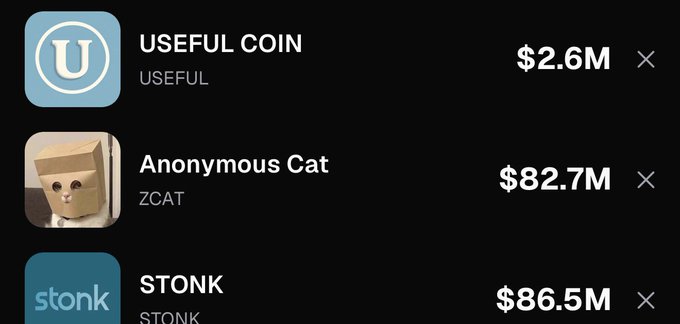 The image displays a cryptocurrency market tracker showing three meme coins with their respective market caps: USEFUL COIN (USEFUL) at $2.6M, Anonymous Cat (ZCAT) at $82.7M, and STONK (STONK) at $86.5M. The post's thesis about $USEFUL benefiting the "Stonk Eco" aligns with the visible listing of these interconnected meme tokens, highlighting $USEFUL's smaller market cap compared to $STONK and suggesting potential growth as it adds holders to related ecosystem tokens like $USELESS.