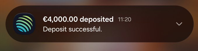 A phone notification from an app showing "€4,000.00 deposited" and "Deposit successful." at 11:20