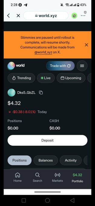A mobile screenshot of the world.xyz app displays an orange banner announcing "Stimmies are paused until rollout is complete, will resume shortly," with the "world" token (Dks5.GbZL) trading at $4.32, down 8.01% (-$0.38) for the day. The image relates to the post by showing the paused airdrop/stimmies status for the Worldcoin-based trading platform.