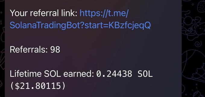 A screenshot showing a referral link for a Solana Trading Bot (https://t.me/SolanaTradingBot?start=KBzfcjeqQ), displaying 98 referrals and 0.24438 SOL ($21.80115) earned lifetime.