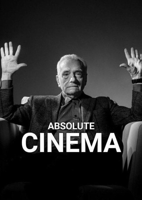 A black and white photo shows an older man with gray hair sitting in a chair with his arms raised, accompanied by the bold white text 'ABSOLUTE CINEMA' across the bottom.