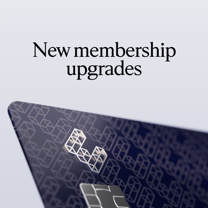 The image features a close-up of a dark-colored credit card with a metallic chip, set against a light background, alongside the text "New membership upgrades." This visual aligns with the post's announcement of new membership tier benefits, showcasing the premium card design that likely reflects the upgraded status and exclusive perks being introduced.
