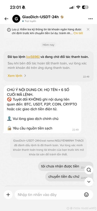 A Telegram chat screenshot between a user and "GiaoDich-USD-24h" showing a pending order (#sx5696) where the buyer "NGUYỄN MINH THẠO" hasn't transferred payment, with the seller asking "tôi chưa nhận được tiền" (haven't received the money) and "chuyển tiền đư chư" (have you transferred yet), illustrating the P2P scam warning about marking as paid before actually sending funds.