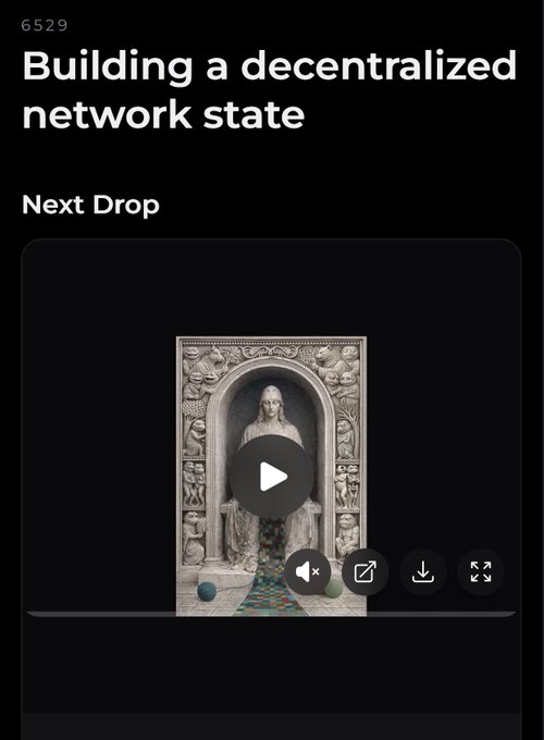 A mobile screen displaying "6529 Building a decentralized network state" with a "Next Drop" section featuring a video thumbnail of a statue with colorful objects.