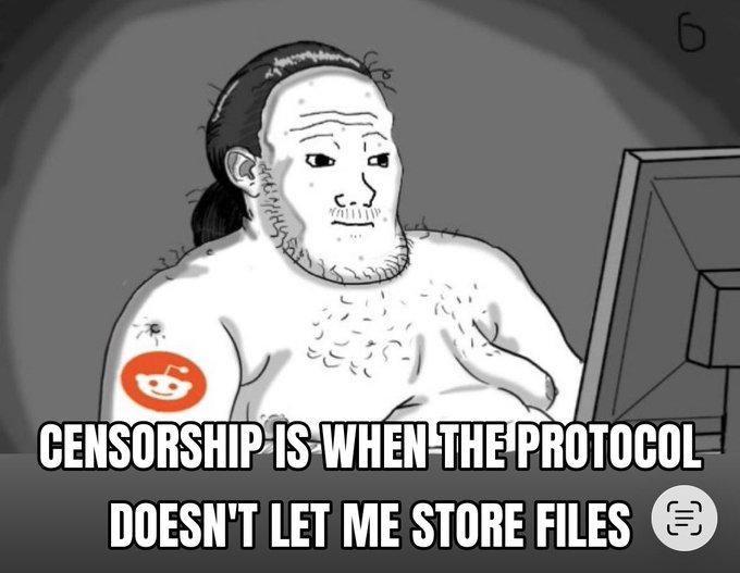 The image features an illustration of a man with a beard wearing a tank top, sitting at a computer desk while using a mouse. The caption below the image reads "Censorship is when the Protocol doesn't let me store files", which seems to be a reference to Bitcoin and its use in the internet age.