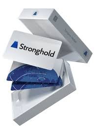 A stack of white product boxes branded with "Stronghold" and a blue triangular logo, with the top box open to reveal a watch or similar item resting on blue patterned tissue paper.