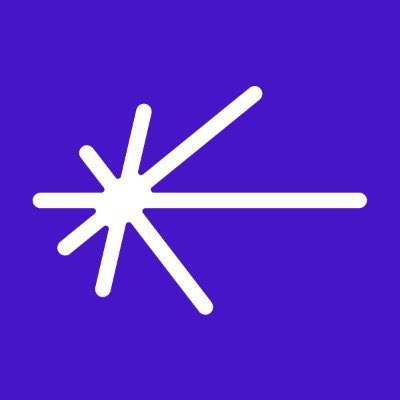 A simple logo featuring a white asterisk-like starburst design centered on a solid purple background.