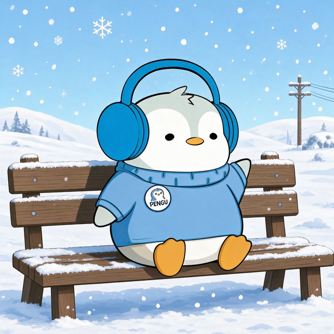 A cartoon illustration of a chubby penguin wearing blue headphones and a 'PENGU' sweatshirt, sitting on a snow-covered wooden bench as snowflakes fall.
