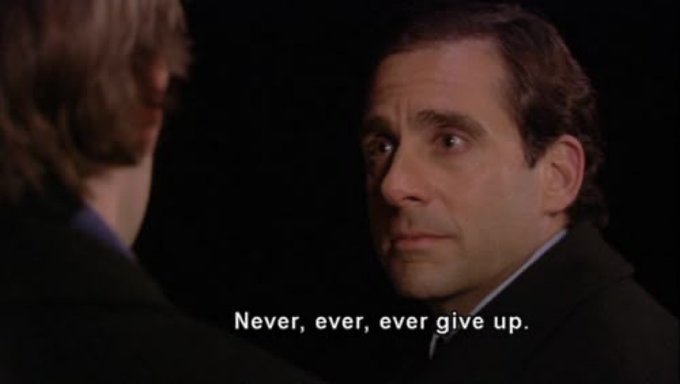 A still from a movie shows Steve Carell's character intensely speaking with the caption 'Never, ever, ever give up.'