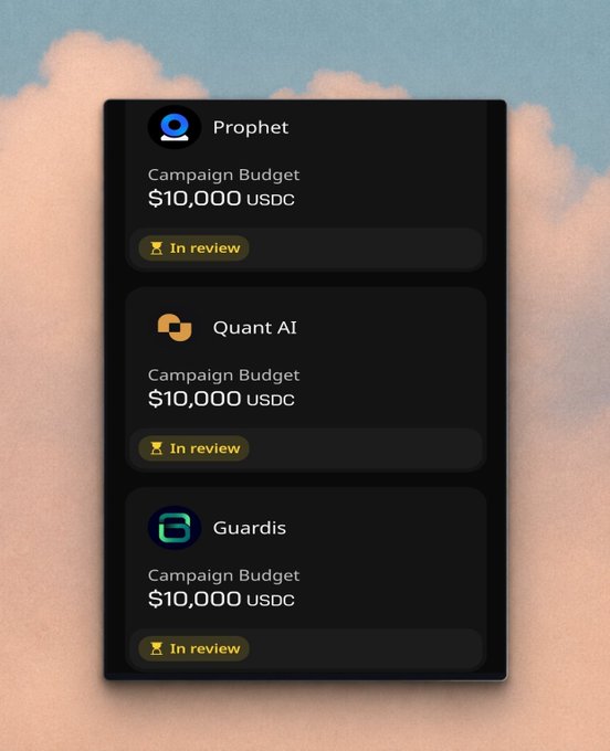 The image focuses on a screen displaying three different app icons, each representing a budget app designed for small creators. The first app icon features a white bird with a yellow beak against a blue sky background. The second icon is red with a green border, and the third app icon is yellow and black, situated on the right side of the screen near a cloud-filled sky backdrop. The bottom part of the image contains text that reads "just realized if you are not a ... we're for small creators..." This suggests an ongoing conversation or discussion about these budget apps.