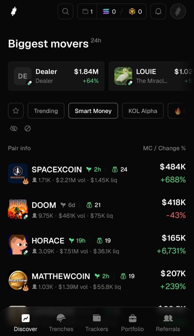 A mobile screenshot of the Trady trading terminal showing a "Biggest movers 24h" section featuring top gainers like LOUIE (+688%) and MATTHEWCOIN (+239%), alongside a list of trending memecoins such as SPACEXCOIN ($484K), DOOM ($418K, -43%), HORACE ($165K, +6,731%), and MATTHEWCOIN ($207K), with navigation tabs including Discover, Trenches, Trackers, Portfolio, and Referrals at the bottom. The interface highlights customizable filter categories like Trending, Smart Money, and KOL Alpha, illustrating the post's point about shaping the radar around personal filters rather than a one-size-fits-all trending feed.