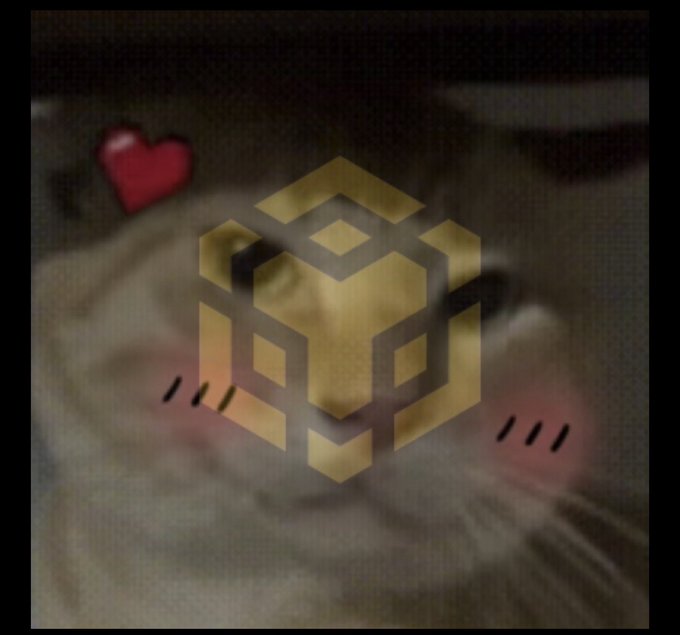 The image shows a close-up of a fluffy hamster's face with a gold geometric cube logo and a small red heart overlaid, representing the meme token "哈基米" (Hakimi) being given back to the community as an airdrop. The hamster appears content with closed eyes, fitting the wholesome gesture of returning tokens to holders.