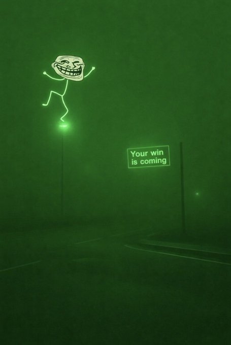 A dark green-tinted image showing a troll face meme figure illuminated in green light, with a sign reading 'Your win is coming' beside it.