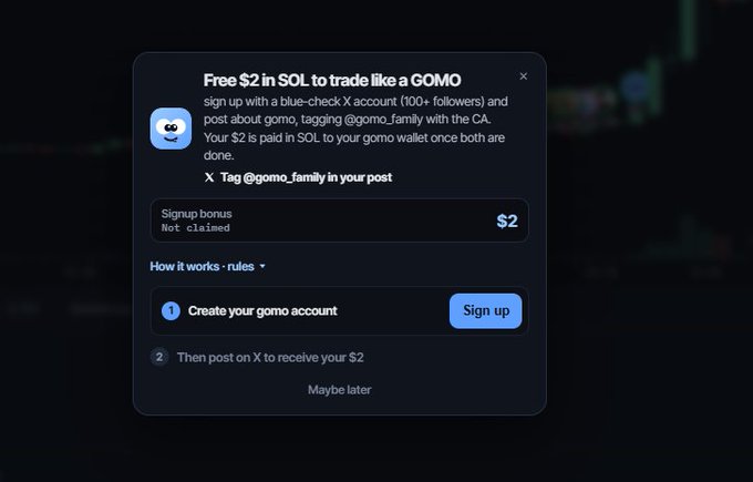 A pop-up notification offering 'Free $2 in SOL to trade like a GOMO' for signing up with a blue-check X account and posting about @gomo_family with a Sign up button.