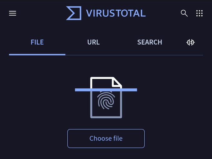 The image shows the VirusTotal website interface on the "FILE" tab, featuring a file upload icon and a "Choose file" button, which the accompanying post references as a simple tool people could use to verify files for malware before interacting with them, implying that crypto users losing funds to scams/drains could be avoided by checking suspicious files on VirusTotal.