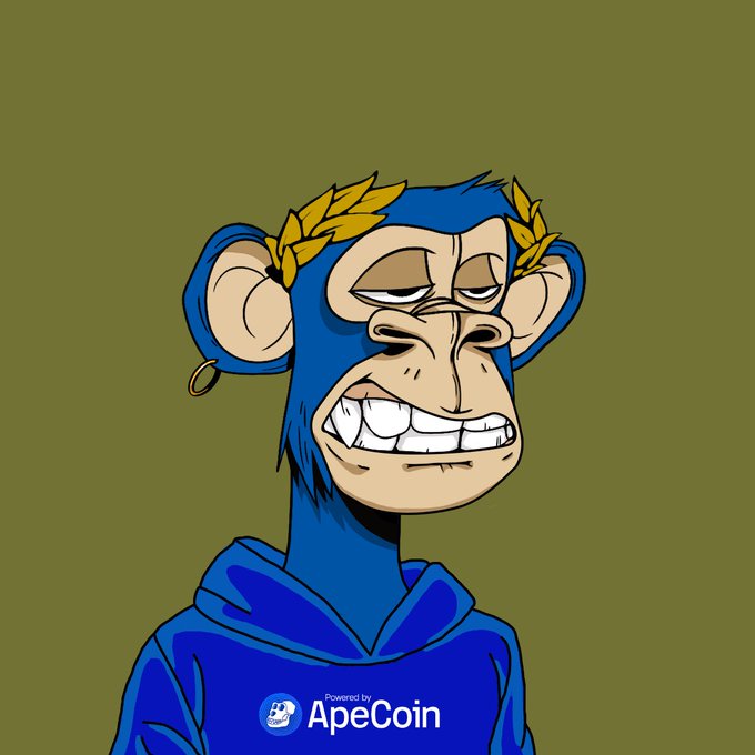 A cartoon blue monkey NFT with a golden laurel wreath, grinning widely, branded 'Powered by ApeCoin' at the bottom.