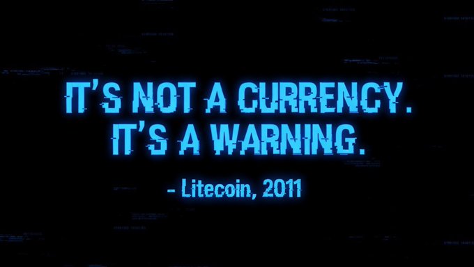 The image features a dark blue background with white text that reads "It's not a currency, it's a warning." The text is written in a blocky font style, which gives it an artistic appearance. Below this text, there are some numbers related to Litecoin and Bitcoin, possibly indicating the popularity or value of these digital assets over time.