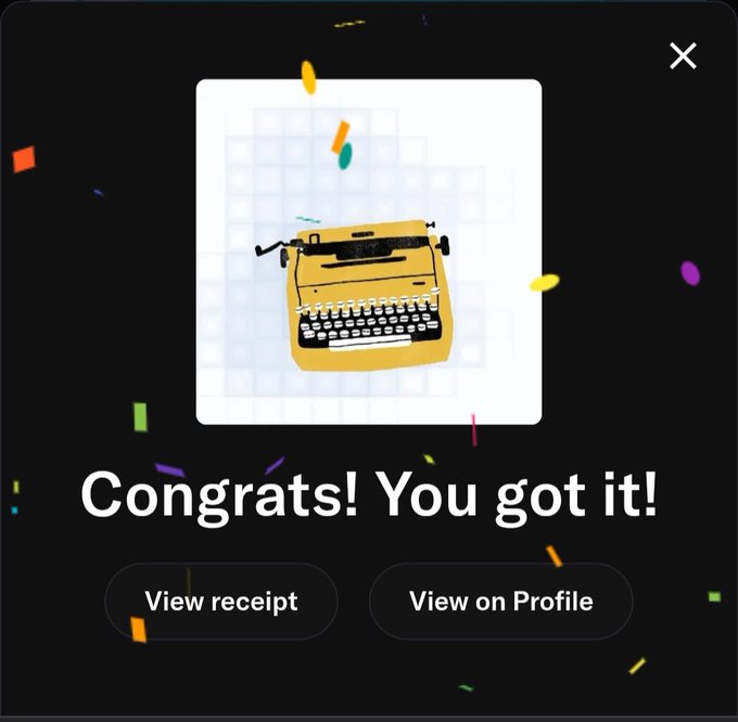 A dark-themed digital interface displays a yellow typewriter image with confetti animations and the text 'Congrats! You got it!' alongside buttons for 'View receipt' and 'View on Profile'.