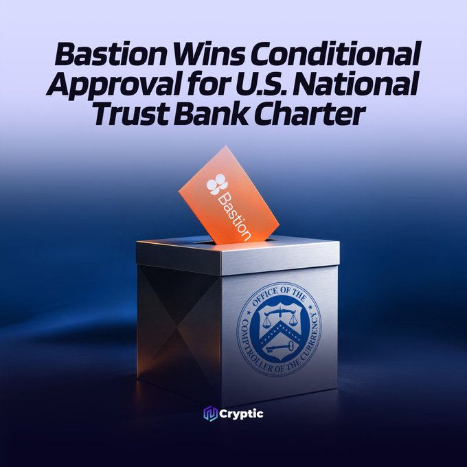 A promotional graphic showing a metallic ballot box with a blue seal for the "Office of the Comptroller of the Currency" on its side, with an orange card reading "Bastion" being inserted into the slot. The headline reads "Bastion Wins Conditional Approval for U.S. National Trust Bank Charter," visually representing Bastion's conditional OCC approval to operate as a federally regulated national trust bank.