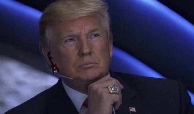 This image shows Donald Trump wearing a championship ring and a headset, relevant to the post offering access to a "Trump coin" contract address.